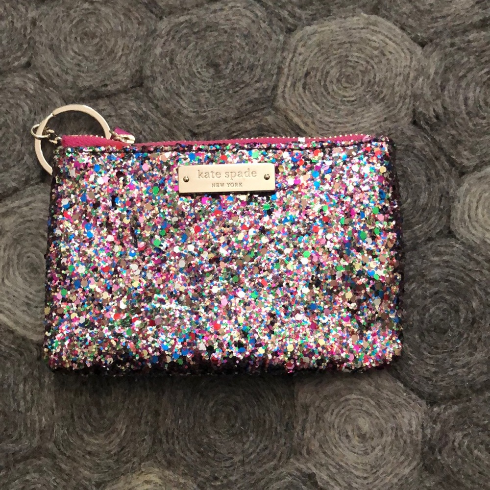 Kate Spade multi color glitter coin purse with key chain.
